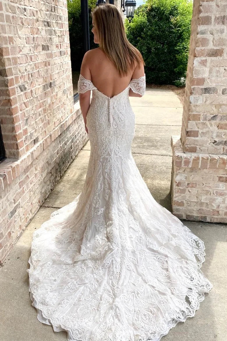 Vestido de novia de sirena con escote corazón y bordado